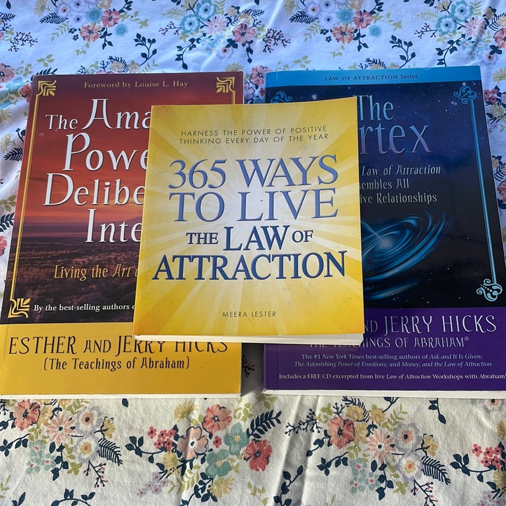 Three law of attraction books, new condition